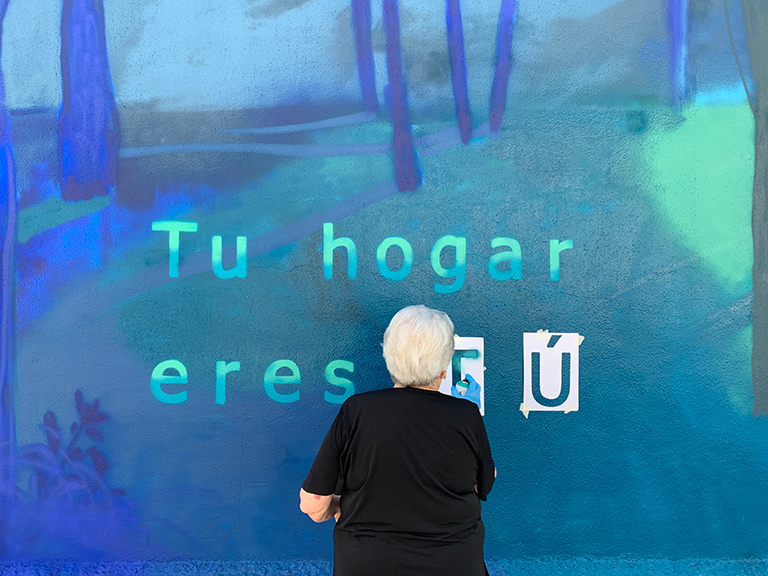 María Ortega Estepa. Mural Tu Hogar eres Tú. Festival de Arte Urbano IGUALARTE
